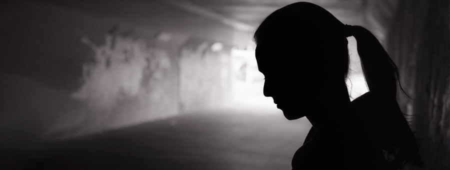 Silhouette of teen girl.